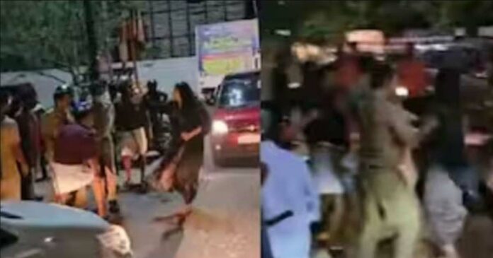 The woman's act of drunkenness in the middle of the road, the police and locals who tried to stop her were beaten up, and Razina, who was arrested, was remanded for 14 days.